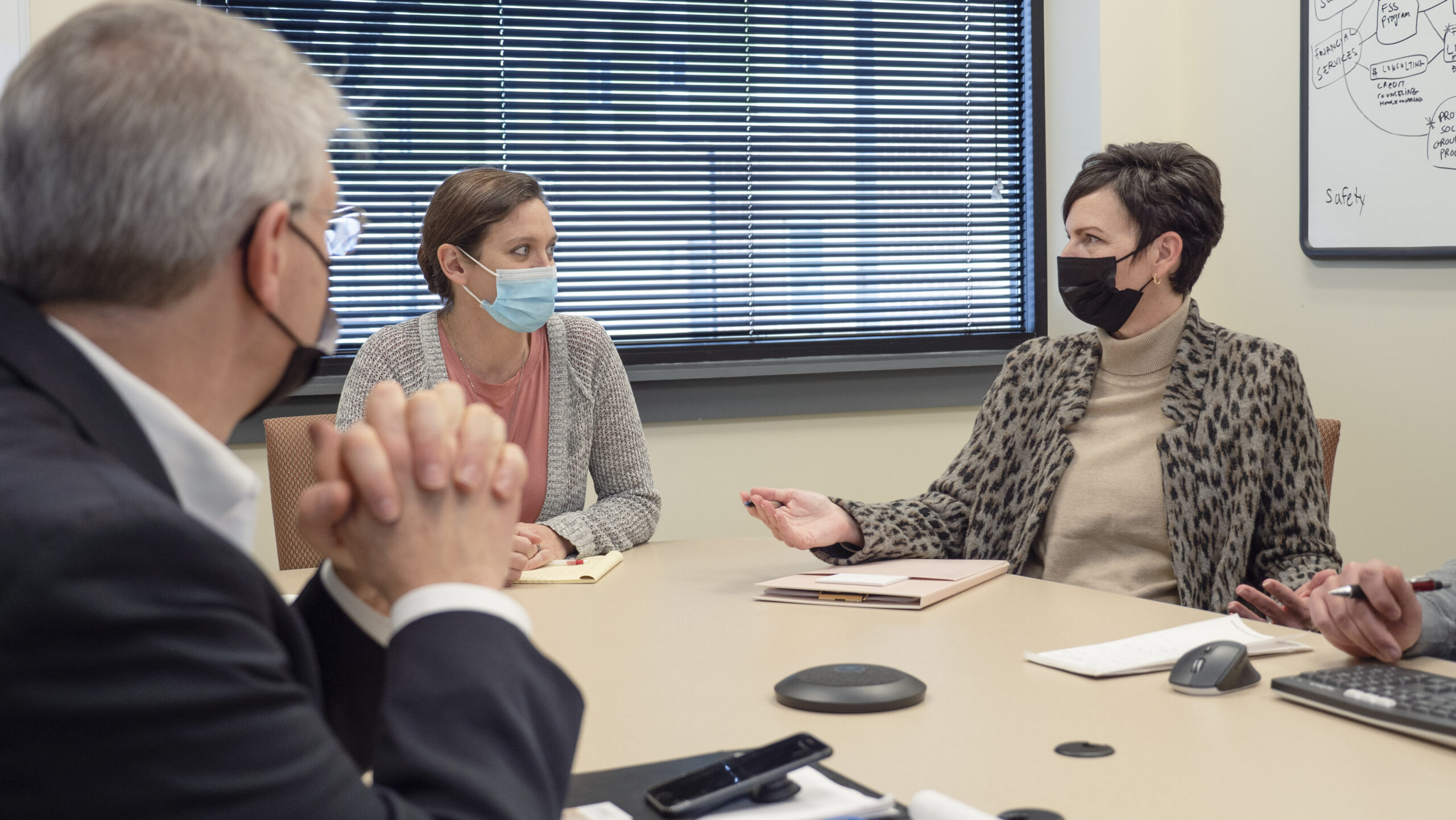 Susan Bull, CEO of Arbor Housing and Development, in a staff meeting